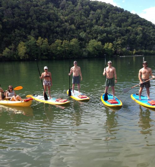 Men Paddleboarding on Lake Austin near Steiner Ranch
